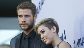 Miley Cyrus rumored to be toning down her image for Liam Hemsworth