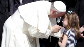 Pope Francis blesses the eyes of 5-year-old girl losing her sight