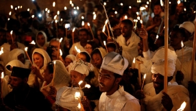 Orthodox Christians celebrate Easter by sharing \'holy fire\' from Jesus\' tomb in Jerusalem to rest of the world