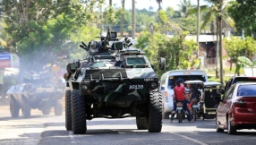 Nine Christians \'shot dead\' by Islamist militants in Philippines as chaos descends on city after church kidnappings