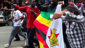 'These are tears of joy': Ecstatic Zimbabweans flood Harare to celebrate expected Mugabe downfall