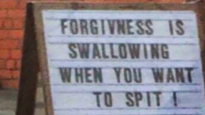 Priest Faces Legal Action for Eye-Catching Signs Outside Church That Include \'Honk If You Like Jesus\'