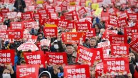 South Koreans march close to presidential Blue House demanding Park resign