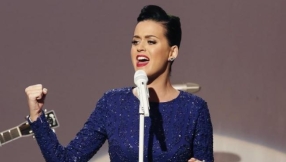 Katy Perry says layers of her Christian upbringing are \'dropping off of me by the day\'