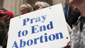 Mother-of-four changes her mind about abortion only to find Jesus and get married a few days later