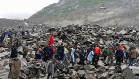 Landslide buries mountain village in southwest China, fears for 141 people