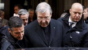 Top papal advisor Cardinal Pell takes leave following abuse charges