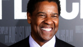 Denzel Washington plays down celebrity status, says he's just a 'God-fearing man who was raised right'