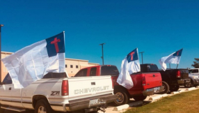 When atheists demand high school removes Christian flag, students get out their own flags to defend their school