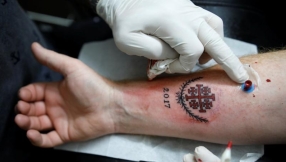 Tattoo artist upholds centuries-old tradition of marking pilgrims during their visit to Holy Land