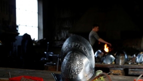 Pope's Swiss Guards show off new 3D printed plastic helmets