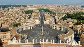 Vatican police detain topless feminist protester breastfeeding baby at St. Peter's Square