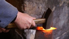 U.S. Church teams up with blacksmiths to turn guns into gardening tools