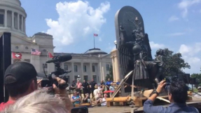 Satanists protest Ten Commandments monument at Arkansas State Capitol by unveiling giant goat-headed statue