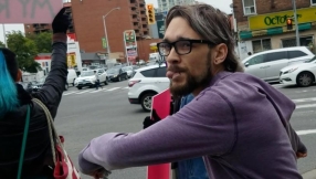 Man charged after video footage of pro-life woman being kicked goes viral