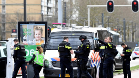 Gunman kills three in Dutch tram, police hunt for Turkish man