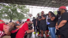 White Christians kneel in repentance for racism before black Christians in viral video