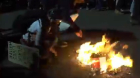 Protesters 'burn Bible' and American flag at Portland demonstration