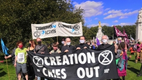 Rowan Williams joins climate action outside Parliament as Christians arrested