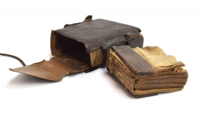 Bible withdrawn from auction over looting claims