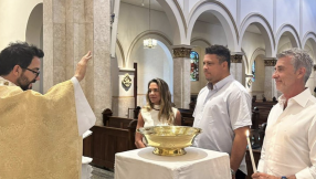 Celebrated footballer Ronaldo gets baptised