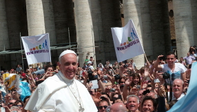 Pope Francis leads Palm Sunday mass, poses for \'selfies\'