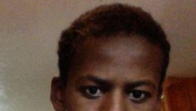 Refugee mother says airplane stowaway son was headed to Somalia to see her