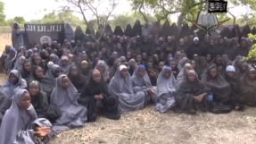 Nigeria schoolgirls video released by Islamist Boko Haram group gives families hope; Nigerian government explores all options to secure safe release