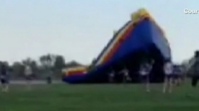 Another \'bouncy castle\' blows away with kids inside; second incident in three weeks [VIDEO]