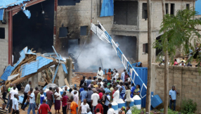 Boko Haram raises their flag after setting village on fire 50 miles from Borno State capital