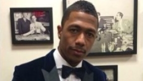 Nick Cannon\'s Mariah tattoo is covered over with Jesus on the cross but fans are divided