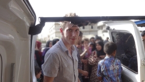 Memorial service for beheaded aid worker Peter Kassig features readings from Bible and Qur\'an