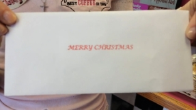 Mystery man resembling Santa Claus passes out $100 bills to stunned Dunkin\' Donuts and Burger King employees