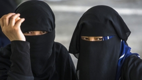 China bans burqa in major Muslim city