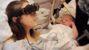 Blind mother sees newborn baby and husband\'s face for first time using special $15k glasses