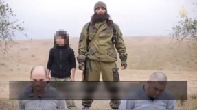 ISIS fighter who appeared alongside child in execution video is dead, say officials