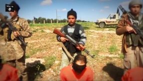 Child soldiers being used by ISIS to lead prisoners to their deaths