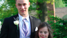 Quarterback makes good on promise to take friend with down syndrome to the prom