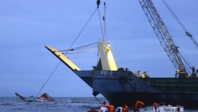 Death toll from capsized Philippines ferry rises to 41, divers halt search