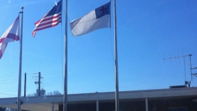 Yielding to atheists, Alabama city removes Christian flag, citing high cost of litigation