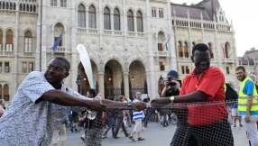 \'Jesus was a migrant too\': Hungarian demonstrators protest border fence 