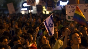 Thousands rally across Israel following gay pride stabbing attack