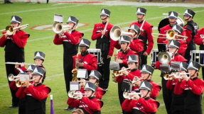 Court bars US school band from performing Christian hymn, but crowd sings it anyway