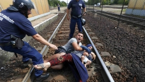 France and Germany urge refugee quota system as Europe struggles under mounting crisis