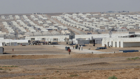 Britain will take thousands more Syrian refugees, says Cameron