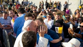 \'Life-changing\' encounter: Pope gets out of car, walks and kiss kid with cerebral palsy