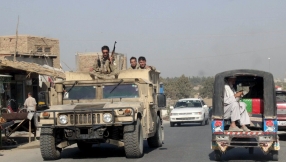 Afghan Taliban seize northern city in blow to government  