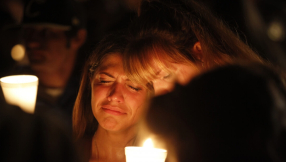 Families and friends grieve for Oregon college massacre victims