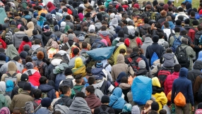 Huge \'invading army\' of able-bodied Muslim men claiming to be refugees marching through Europe