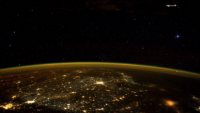 Cigar-shaped glowing \'UFO\' spotted in photo taken by NASA astronaut aboard Space Station